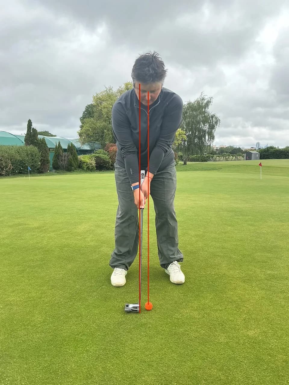 Exercice de putting avec baton d alignement